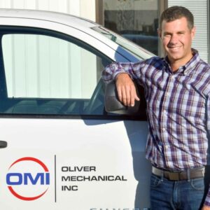 man leaning on a pick up truck